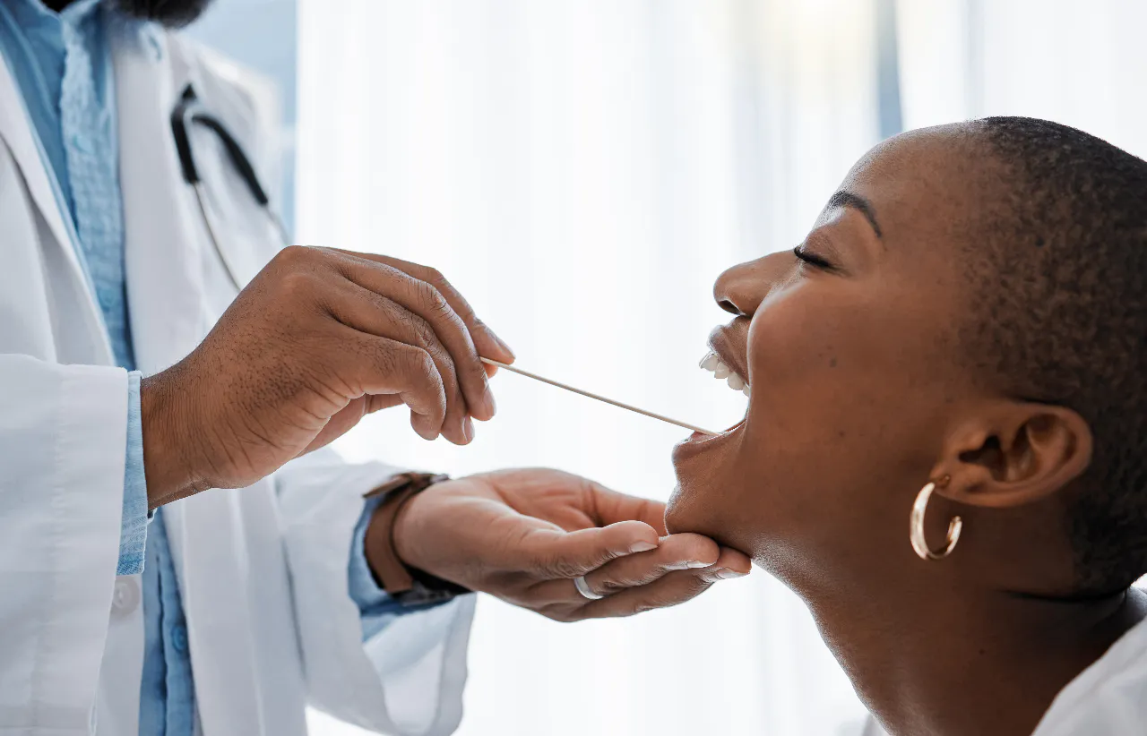 A routine oral cancer screening during a checkup