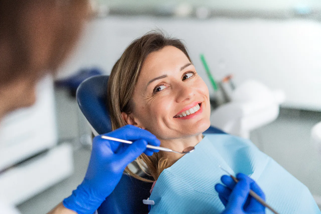 A chipped tooth being examined before oral surgery
