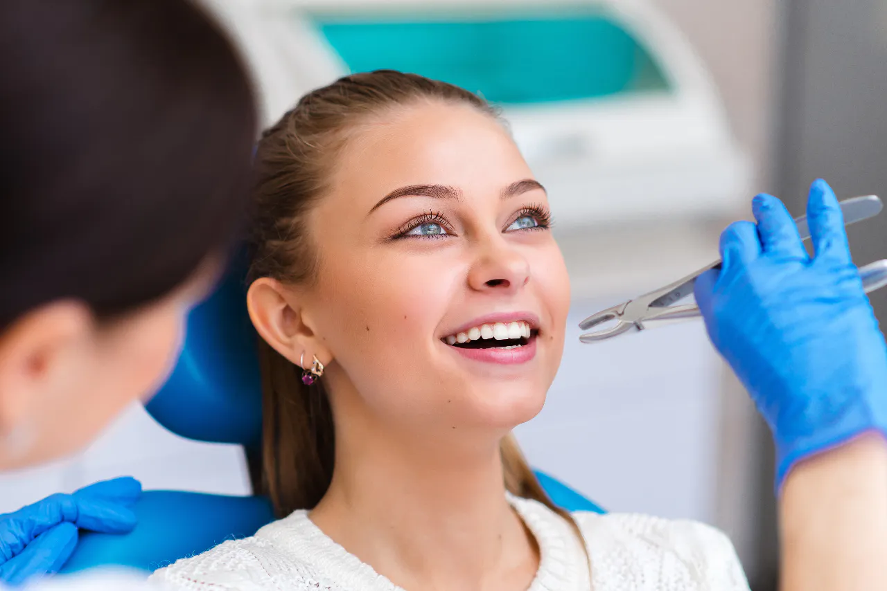 A relaxed patient talking through root canal and extraction options