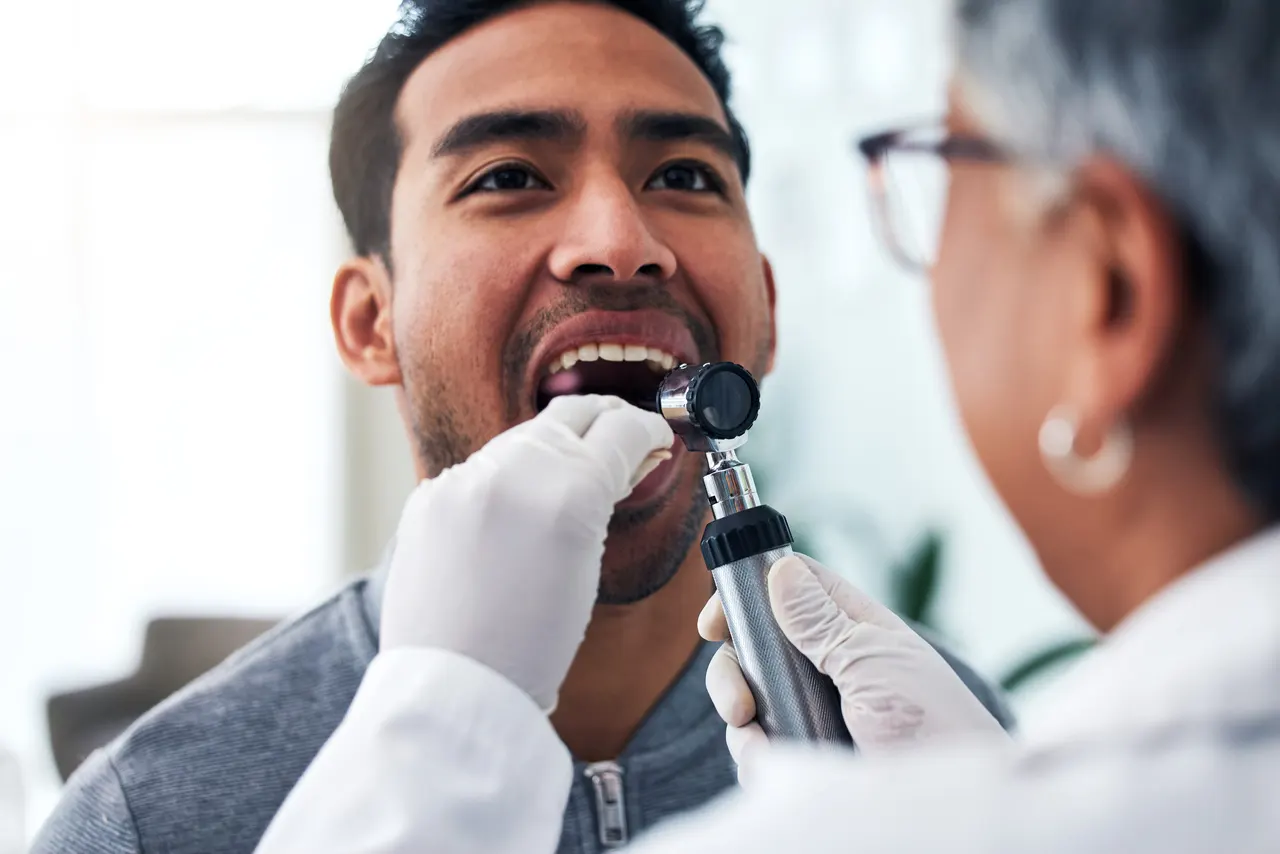 An oral cancer screening during a routine exam